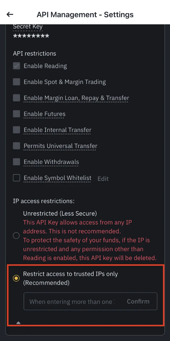 Panneau Restrictions API dans l'application Binance : liste des autorisations (lecture, trading Spot et sur marge, prêt sur marge, Futures, transfert interne, transfert universel, retraits, liste blanche de symboles) et section des restrictions d'adresse IP, avec l'avertissement en rouge sur la suppression de la clé.
