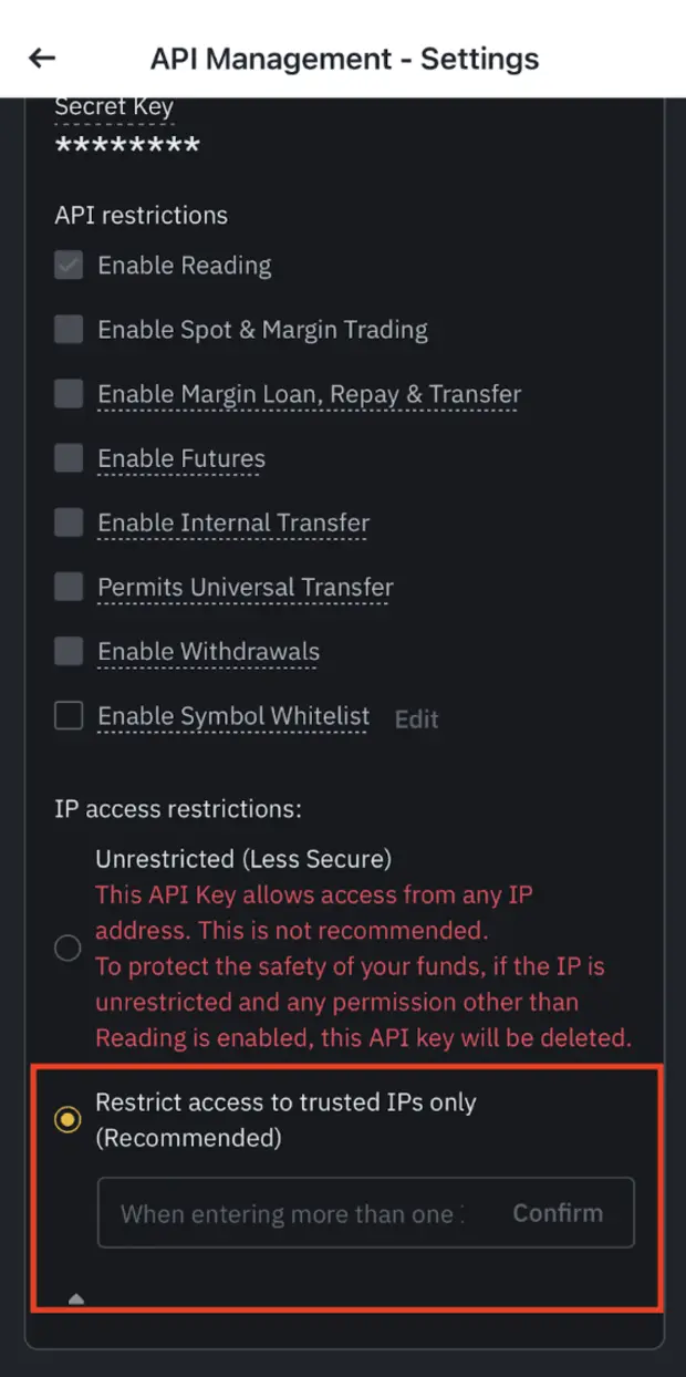 币安 App 的 API 权限设置界面，API restrictions 下方依次是 Enable Reading、Enable Spot & Margin Trading、Enable Margin Loan Repay & Transfer、Enable Futures、Enable Internal Transfer、Permits Universal Transfer、Enable Withdrawals、Enable Symbol Whitelist，下方 IP access restrictions 的红字警告与红框标出的仅限受信任 IP 选项
